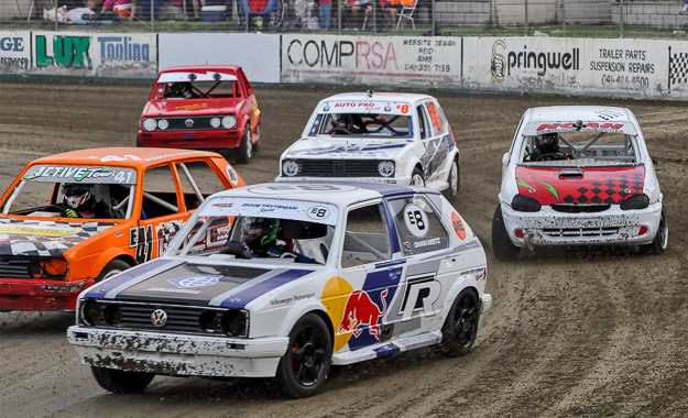 Oval track racers tackle the bend at Victory Raceway.
