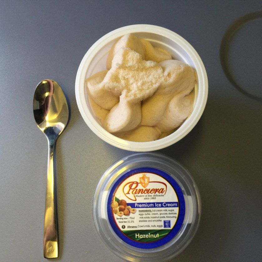 Dessert on the Jhb to Singapore leg was Hazelnut ice cream. Frozen solid too - I wonder if they left them outside considering the temperature of the plane's outer skin was -50 Celsius.