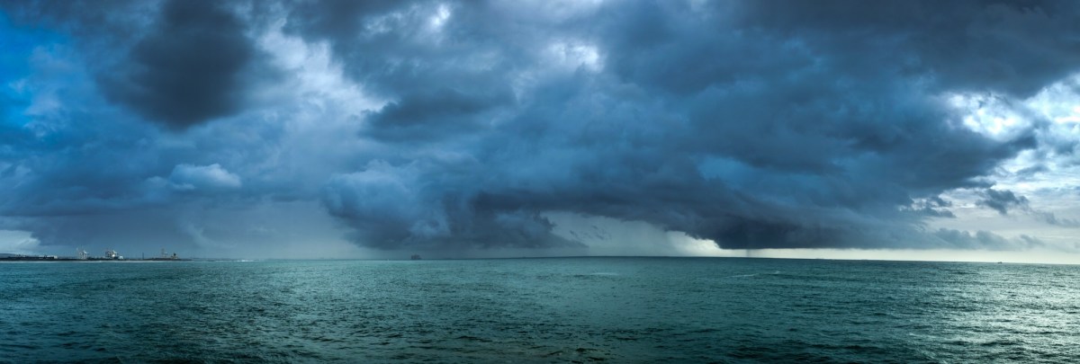 clouds and rain over the sea